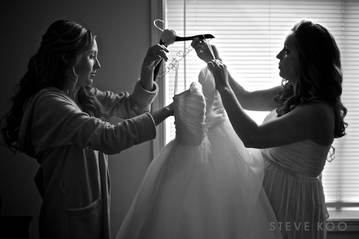 bride-getting-in-dress