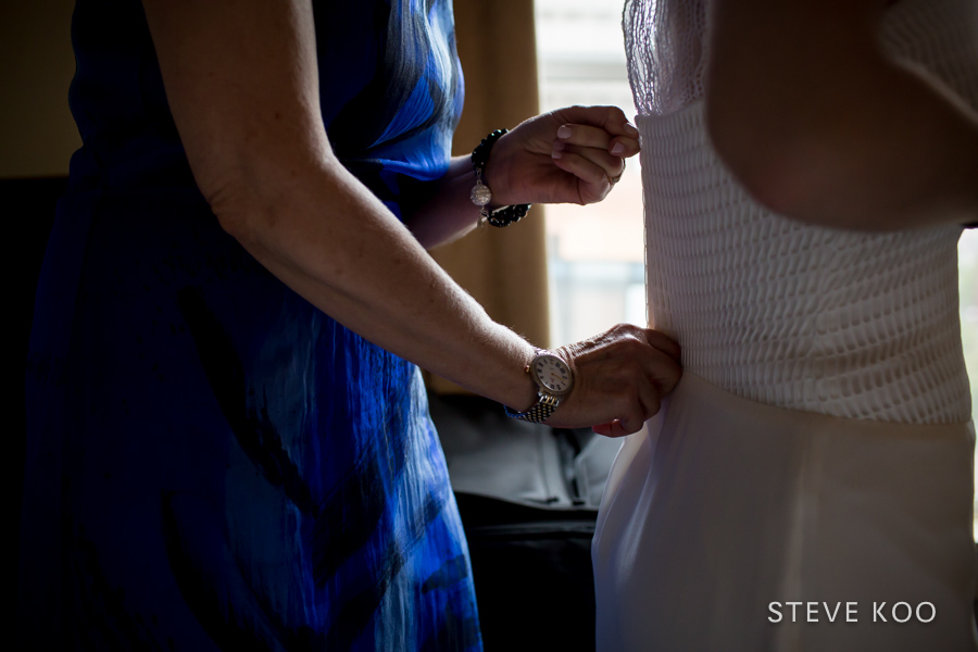 bride-getting-into-dress