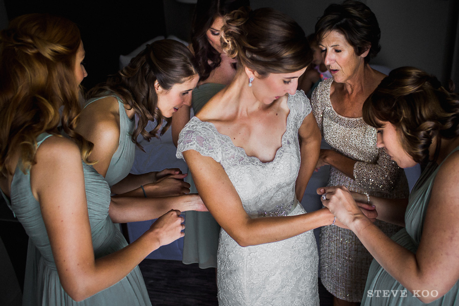 bridesmaids-helping-bride